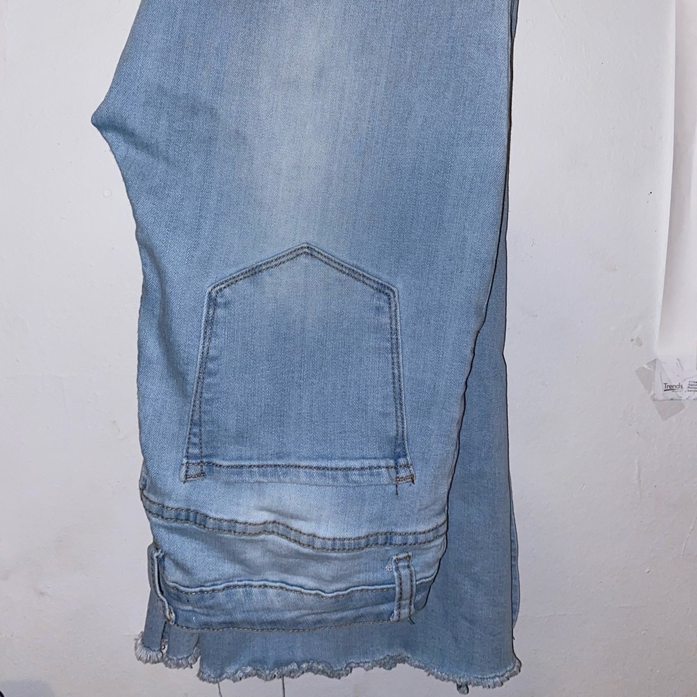 Flare jeans. Very fitting and worn. *lots of compliments on them!*